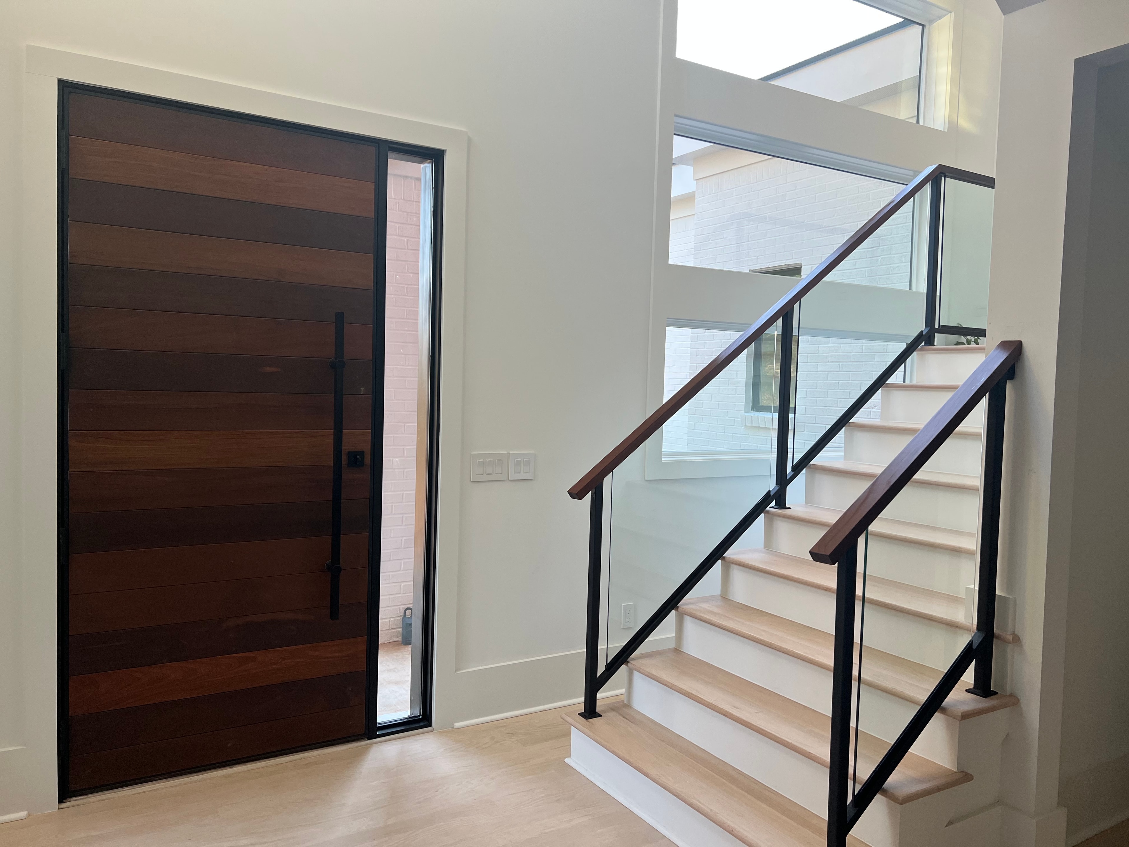 Glass Railing Entry Foyer