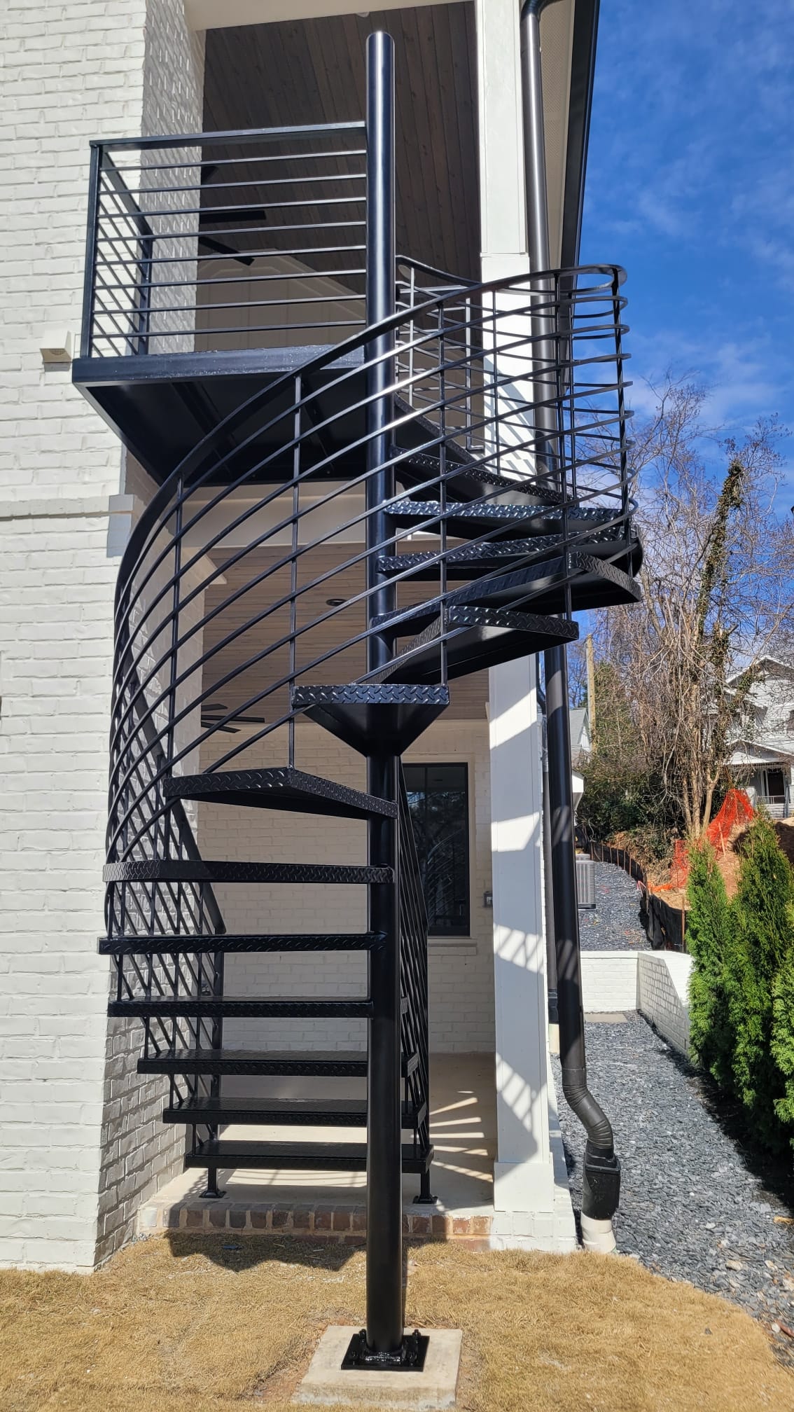 Spiral Staircase White Brick Exterior